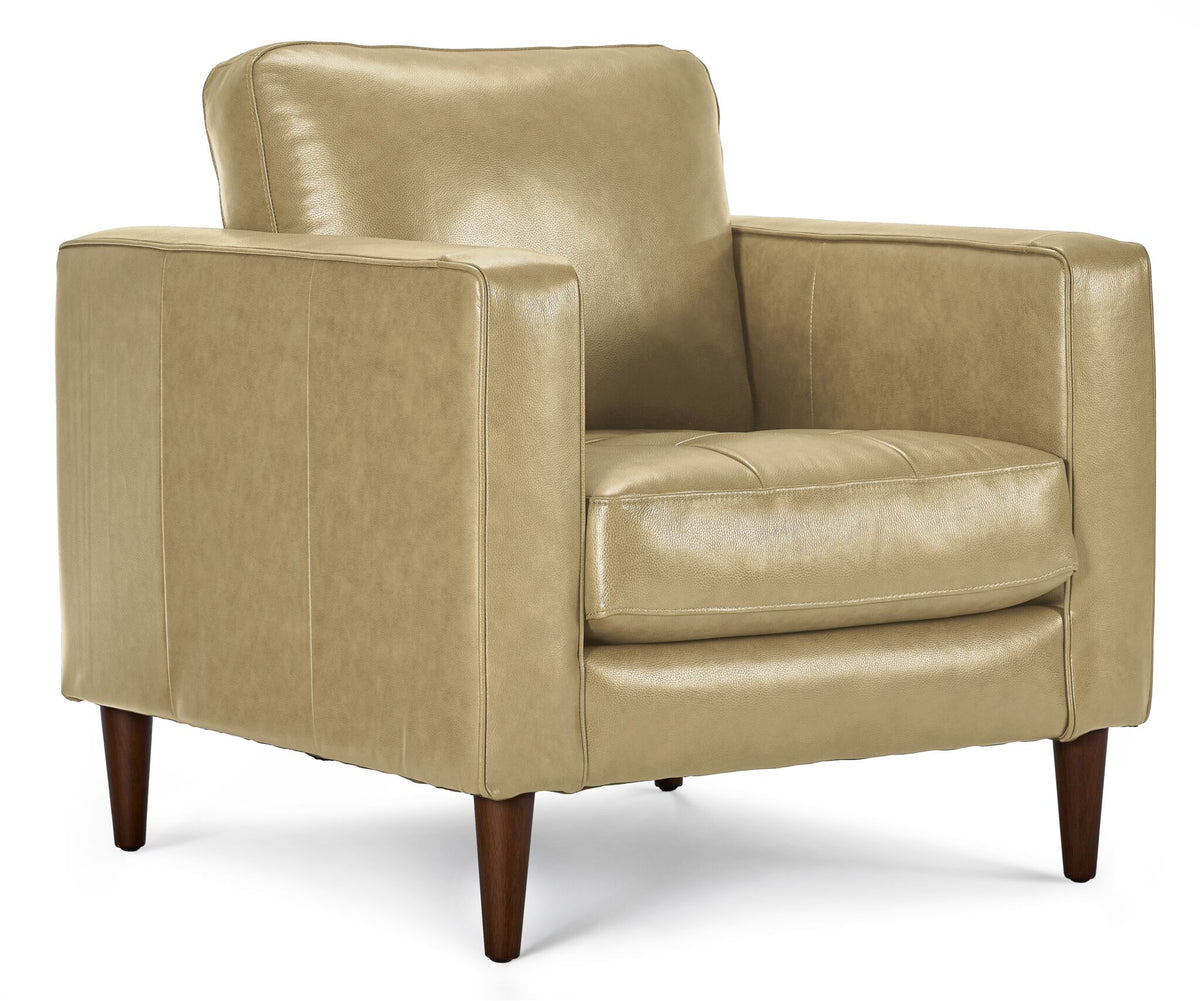 Bari Leather Chair in stone, shown at an angle with a cushioned backrest, tufted seat, straight track arms and tapered wood legs