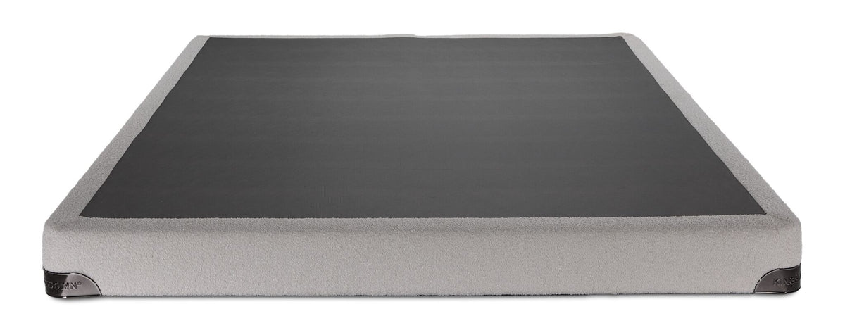 Front view of the Kingsdown White Boucle queen low-profile boxspring with beige polyester upholstery and black support surface