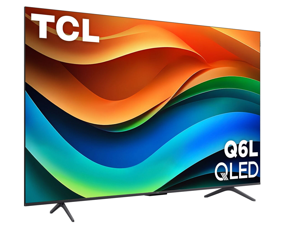 Angled view of TCL 65-inch QLED 4K Smart TV mounted on stand legs