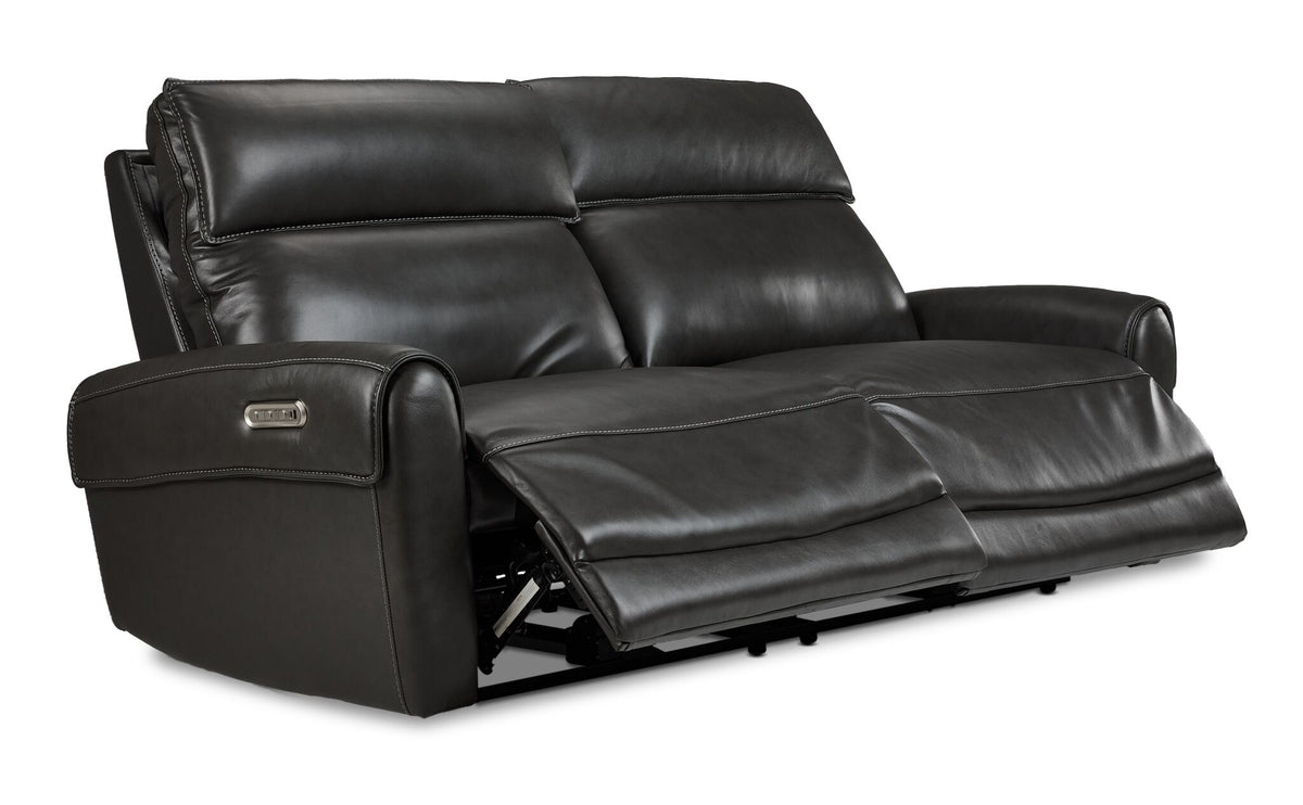 Theo Leather Dual Power Reclining Sofa - Charcoal shown at an angle with both power reclining footrests extended