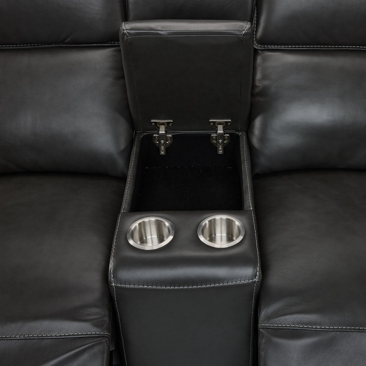 Theo Leather Dual Power Reclining Loveseat with Console - Charcoal close-up of open centre storage compartment and two metal cupholders