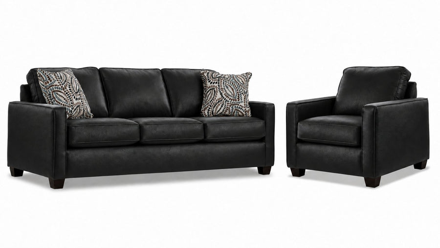 City Leather Sofa and Chair Set - Black with matching leather seating, patterned accent pillows and dark wood legs