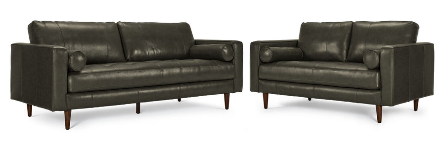 Bari charcoal leather sofa and loveseat set shown together with tufted seats, plush back cushions, bolster pillows and tapered wood legs