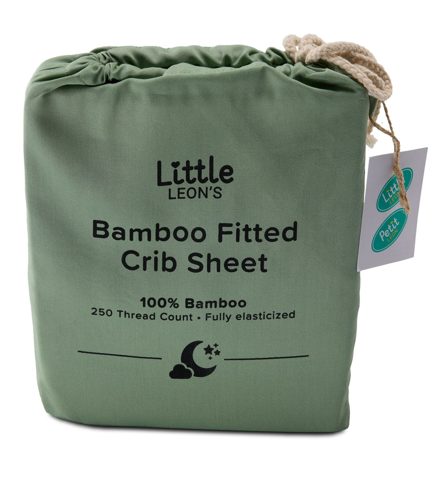 Little Leon’s Bamboo Fitted Crib Sheet in Basil green drawstring packaging with 100% bamboo and 250 thread count details