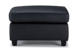 Icon Leather Ottoman - Black, front view with thick padded leather cushion and dark wood feet