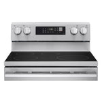 Front detail of LG induction range showing four-zone black glass cooktop, rear controls and stainless steel trim