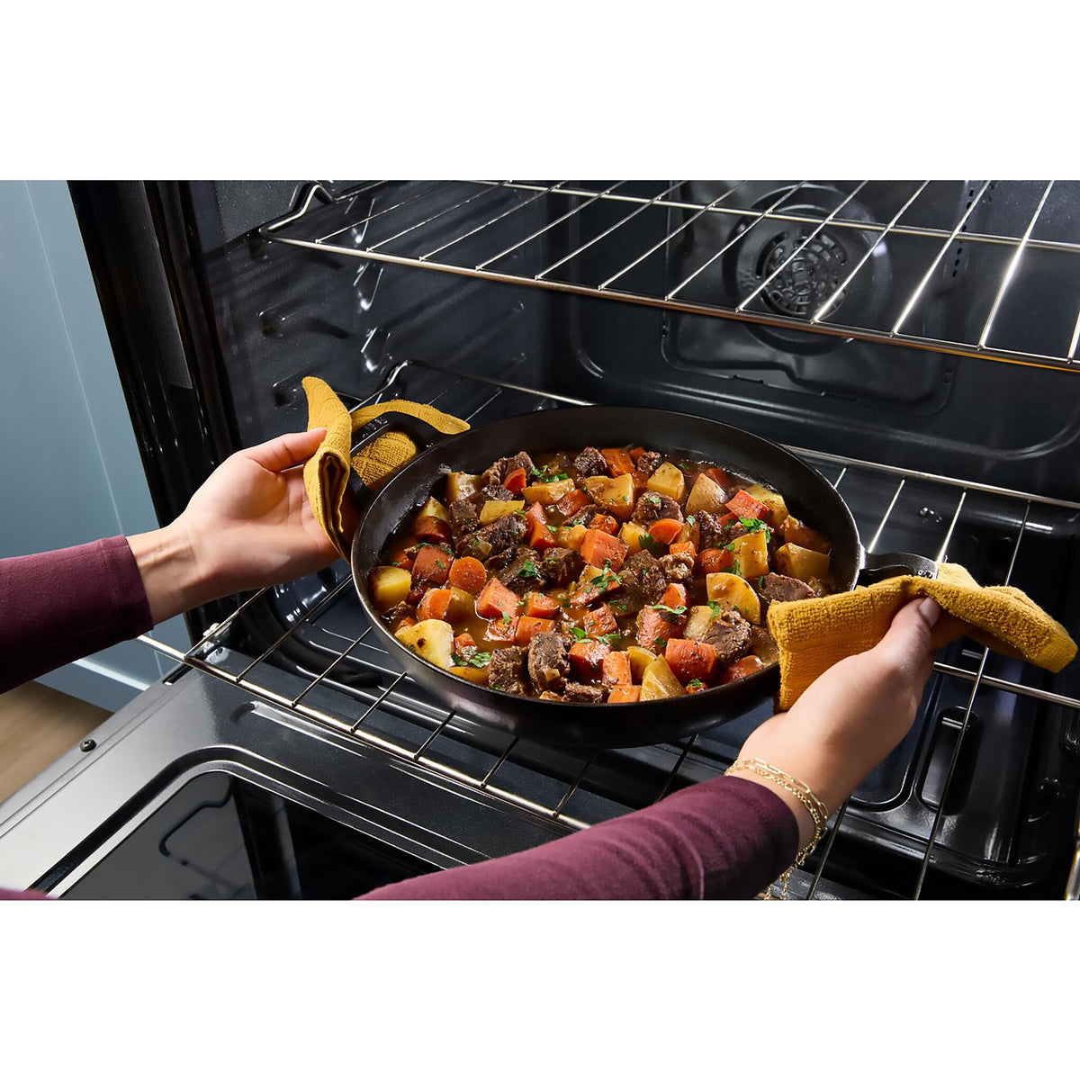 Whirlpool Black-on-Stainless Slide-In Gas Convection Range (5 cu.ft.) - WSGS5030SV